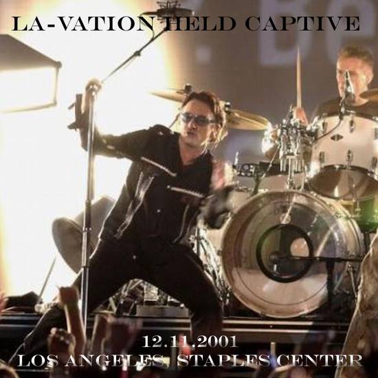 2001-11-12-LosAngeles-LA-VationHeldCaptive-Front.jpg